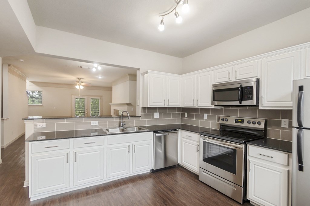 kitchen of the 1320 square foot 2 bedroom, 2 and 1/2 bath floor plan  at The Brownstones, Dallas, Texas
