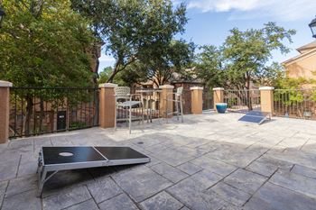 This is a photo of the cornhole court on the game deck at The Brownstones Townhome Apartments in Dallas, TX.