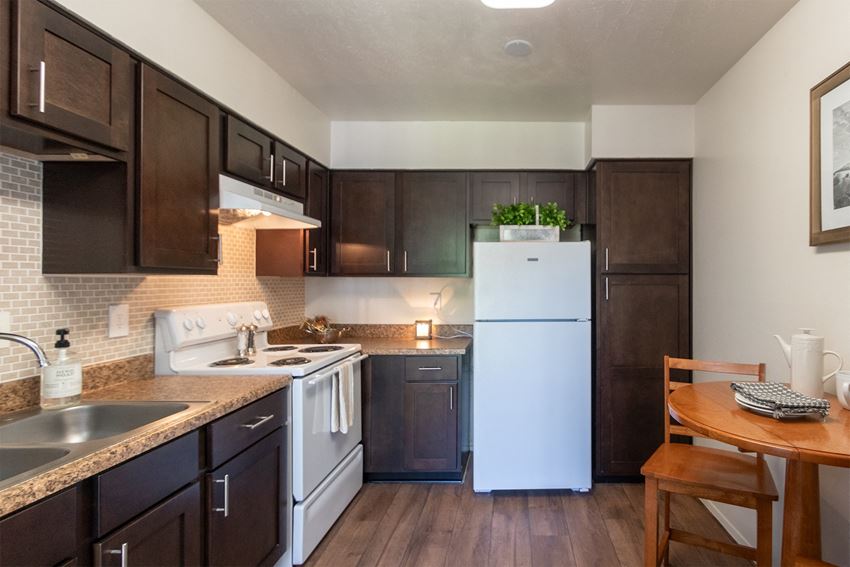 This is a photo of the kitchen of the 590 square foot 1 bedroom, 1 bath model apartment at The Biltmore Apartments located int he Vickery Meadow neighborhood of Dallas, TX.