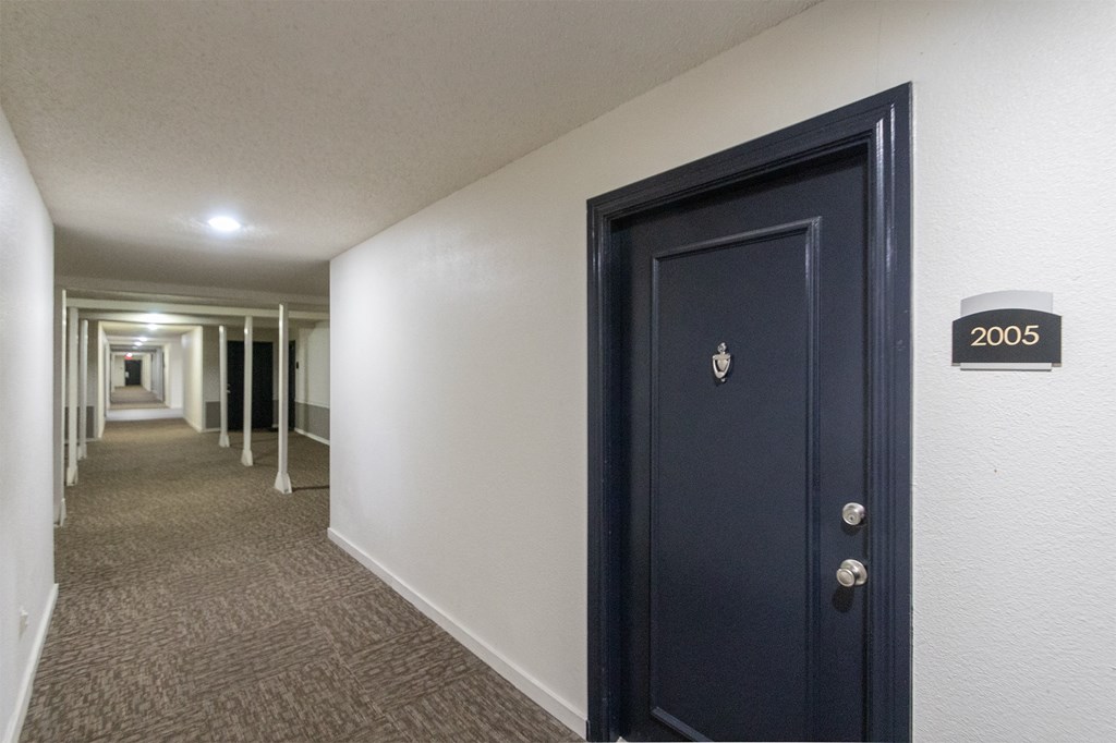 This is a photo of the hallway at Cambridge Court Apartments in Dallas, TX.