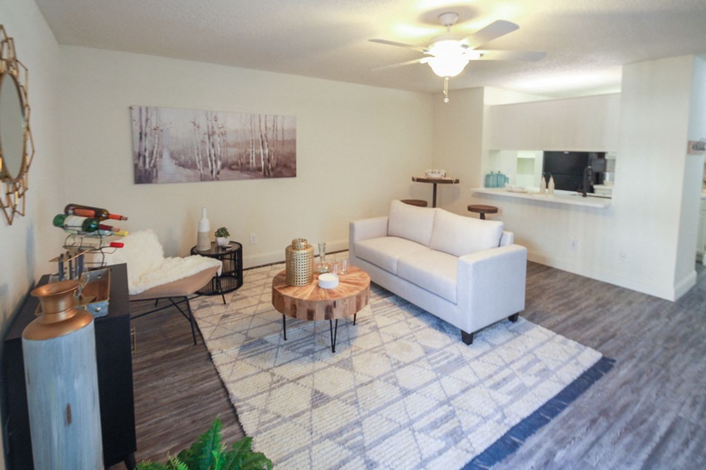 Photo of the living room in a 692 square foot 1 bed, 1 bath model aprtment at Cambridge Court Apartments in Dallas Texas