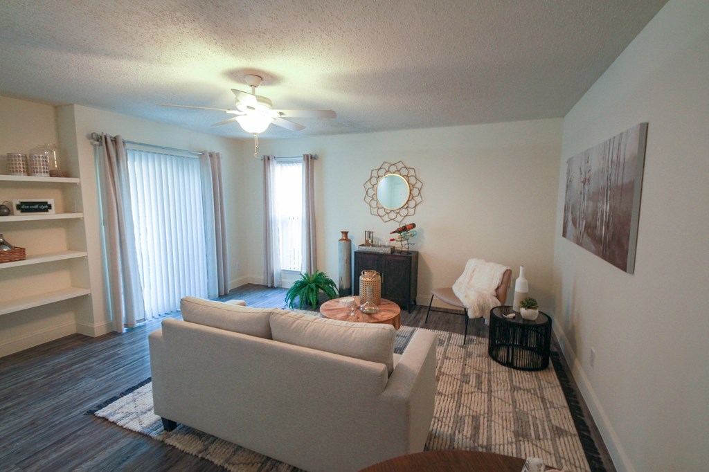 Photo of the living room in a 692 square foot 1 bed, 1 bath model aprtment at Cambridge Court Apartments in Dallas Texas
