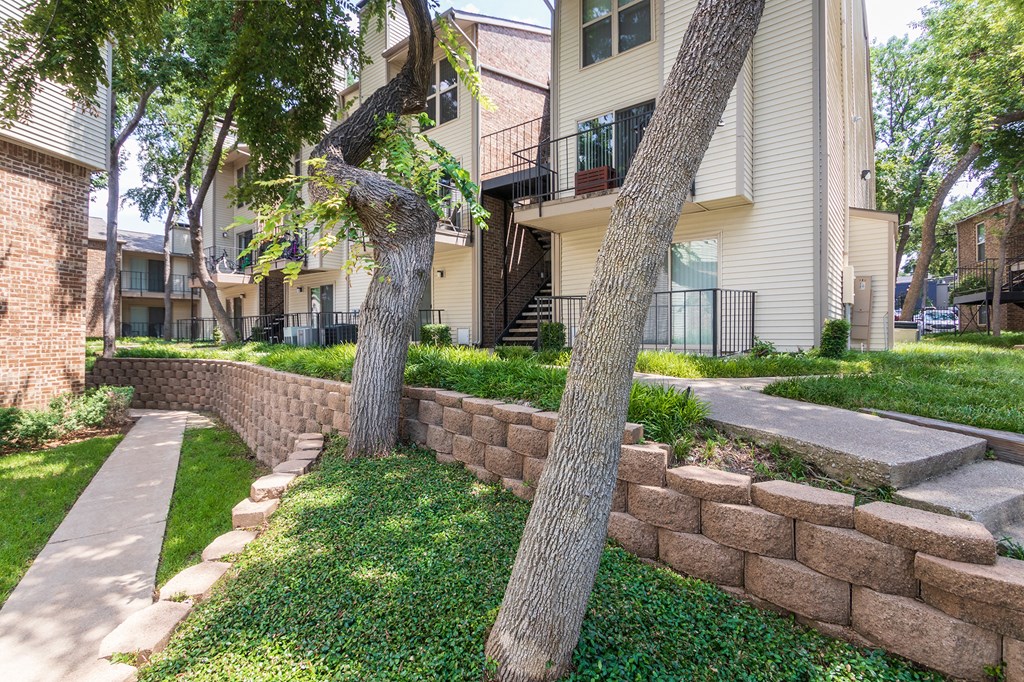 This is a photo of building exteriors/grounds at Canyon Creek Apartments in Dallas, TX.