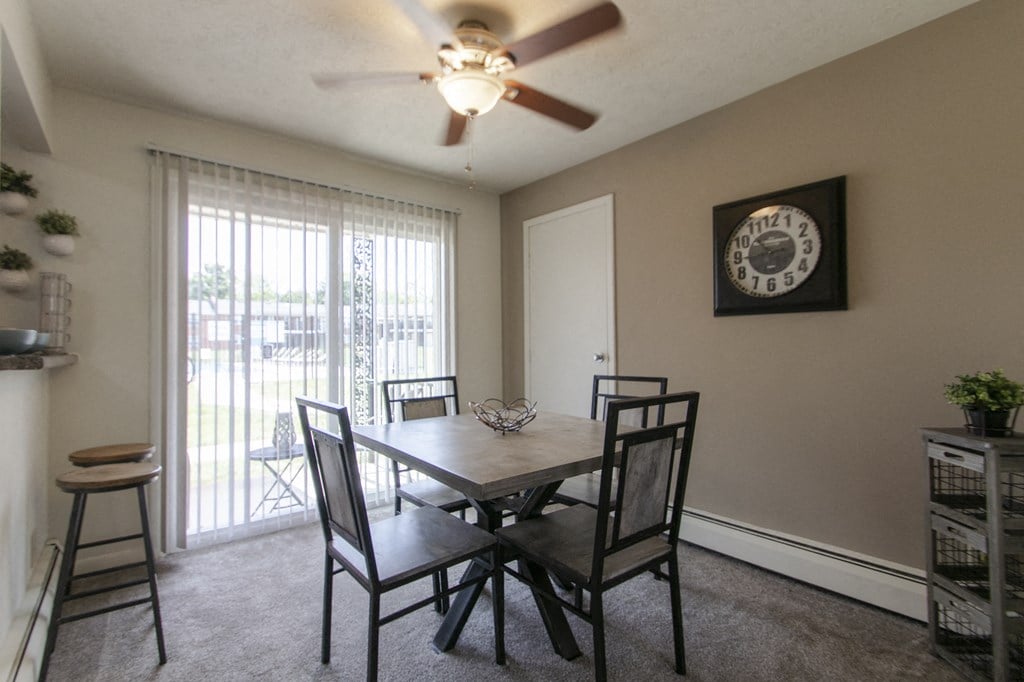 This is a photo of the dining room in the 740 square foot 1 bedroom model apartment at Compton Lake Apartments in Mt. Healthy, OH.