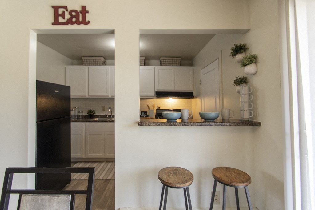 This is a photo of the breakfast bar in the 740 square foot 1 bedroom model apartment at Compton Lake Apartments in Mt. Healthy, OH.