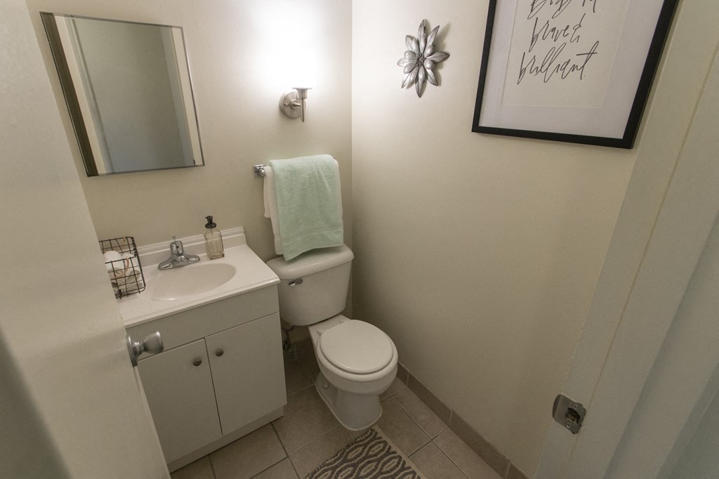 This is a photo of the bathroom in the 740 square foot 1 bedroom model apartment at Compton Lake Apartments in Mt. Healthy, OH.