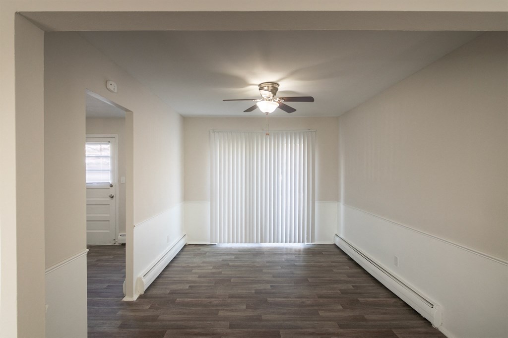 This is a photo of the dining room of the 1004 square foot, 2 bedroom/1 bath Townhome with stackable washer/dryer floor plan at Colonial Ridge Apartments in the Pleasant Ridge neighborhood of Cincinnati, OH.