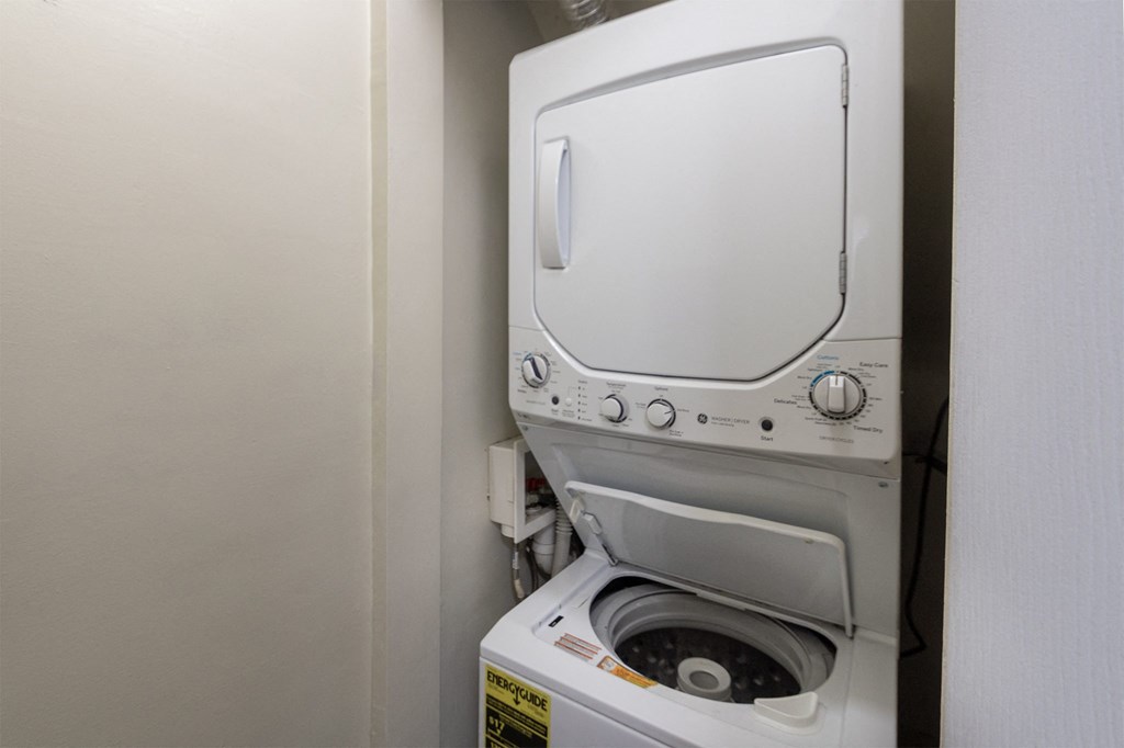 This is a photo of thestackable washer/dryer in the 1004 square foot, 2 bedroom/1 bath Townhome floor plan at Colonial Ridge Apartments in the Pleasant Ridge neighborhood of Cincinnati, OH.