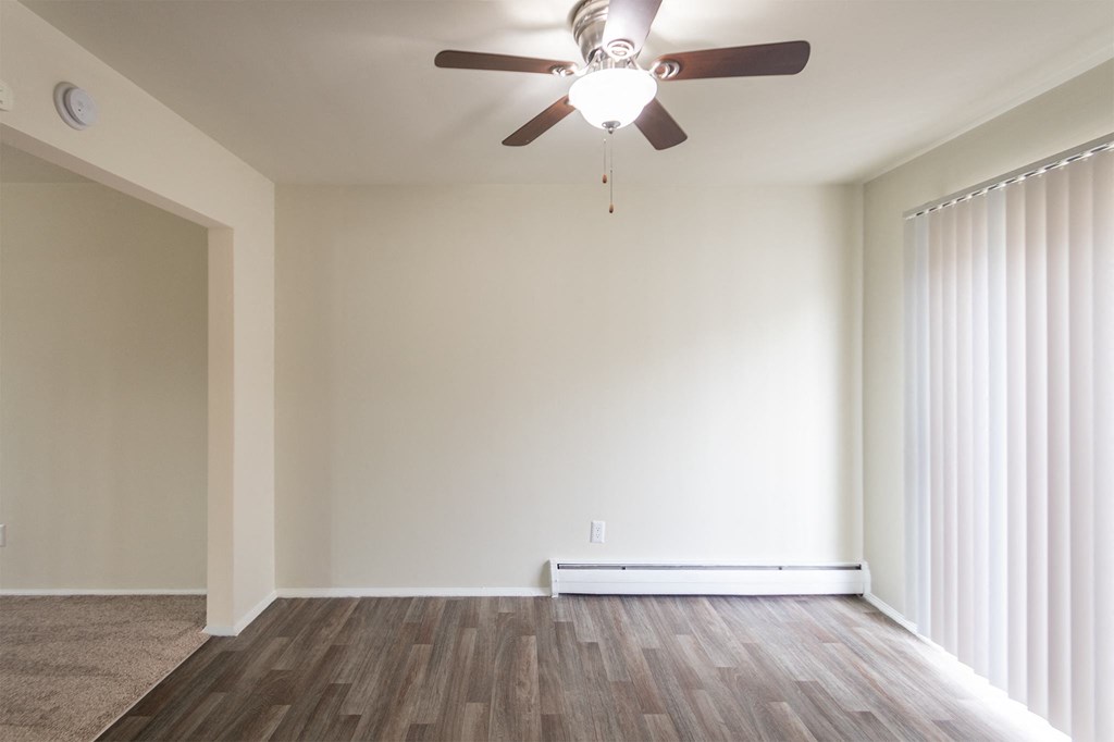 This is a photo of the dining room of the 1004 square foot, 2 bedroom/1 bath Townhome with stackable washer/dryer floor plan at Colonial Ridge Apartments in the Pleasant Ridge neighborhood of Cincinnati, OH.