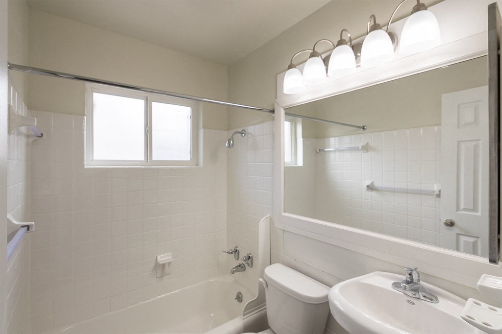 This is a photo of the bathroom of the 1004 square foot, 2 bedroom/1 bath Townhome with stackable washer/dryer floor plan at Colonial Ridge Apartments in the Pleasant Ridge neighborhood of Cincinnati, OH.