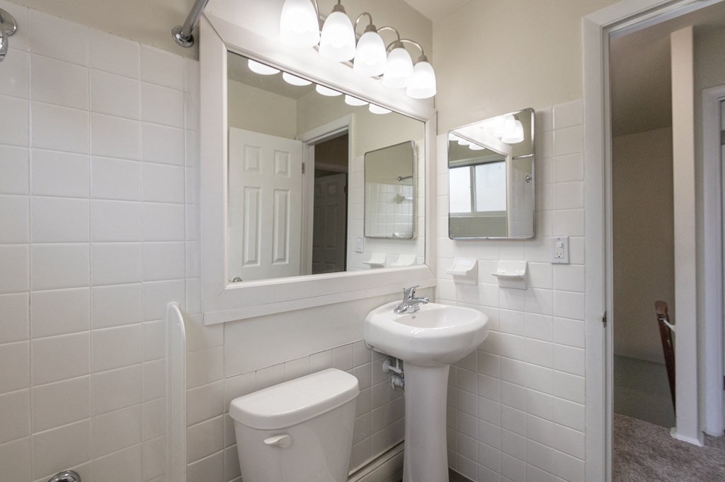 This is a photo of the bathroom of the 1004 square foot, 2 bedroom/1 bath Townhome with stackable washer/dryer floor plan at Colonial Ridge Apartments in the Pleasant Ridge neighborhood of Cincinnati, OH.