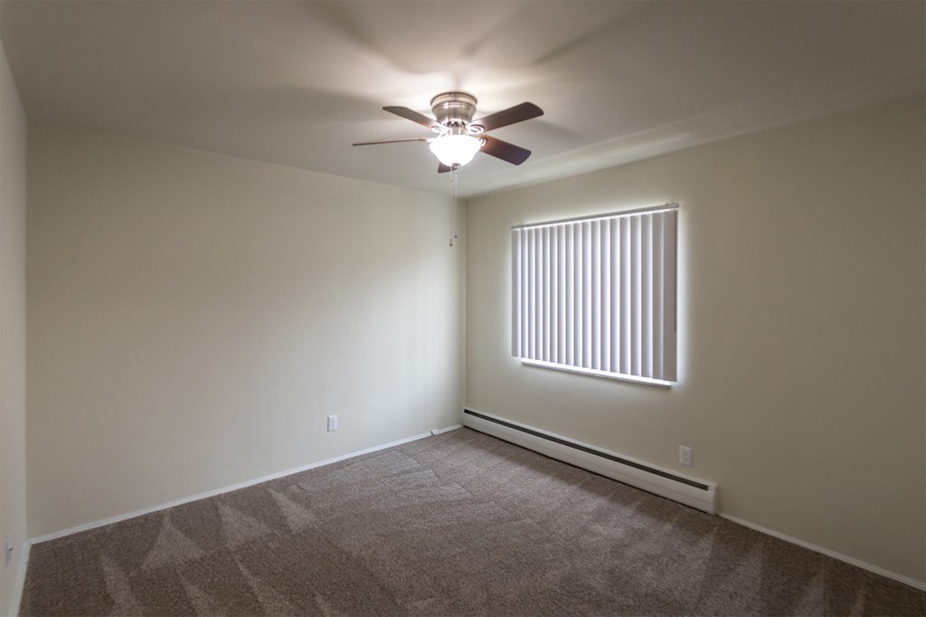 This is a photo of the second bedroom of the 1004 square foot, 2 bedroom/1 bath Townhome with stackable washer/dryer floor plan at Colonial Ridge Apartments in the Pleasant Ridge neighborhood of Cincinnati, OH.
