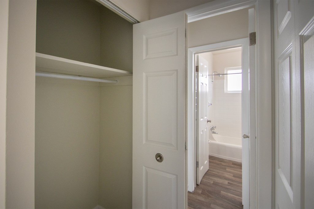This is a photo of the bedroom closet and hallway in the 631 square foot, B-style (Ranch) 1 bedroom/1 bath floor plan at Colonial Ridge Apartments in the Pleasant Ridge neighborhood of Cincinnati, OH.