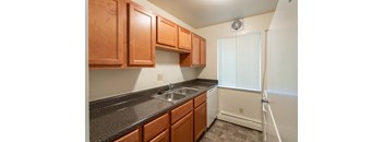 This is a photo of the kitchen in the 620 square foot, 1 bedroom, 1 bath junior floor plan at Colonial Ridge Apartments in the Pleasant Ridge neighborhood of Cincinnati, OH.