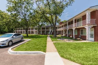 This is a photo of the grounds/building exteriors at Colonial Ridge Apartments in Cincinnati, OH.
