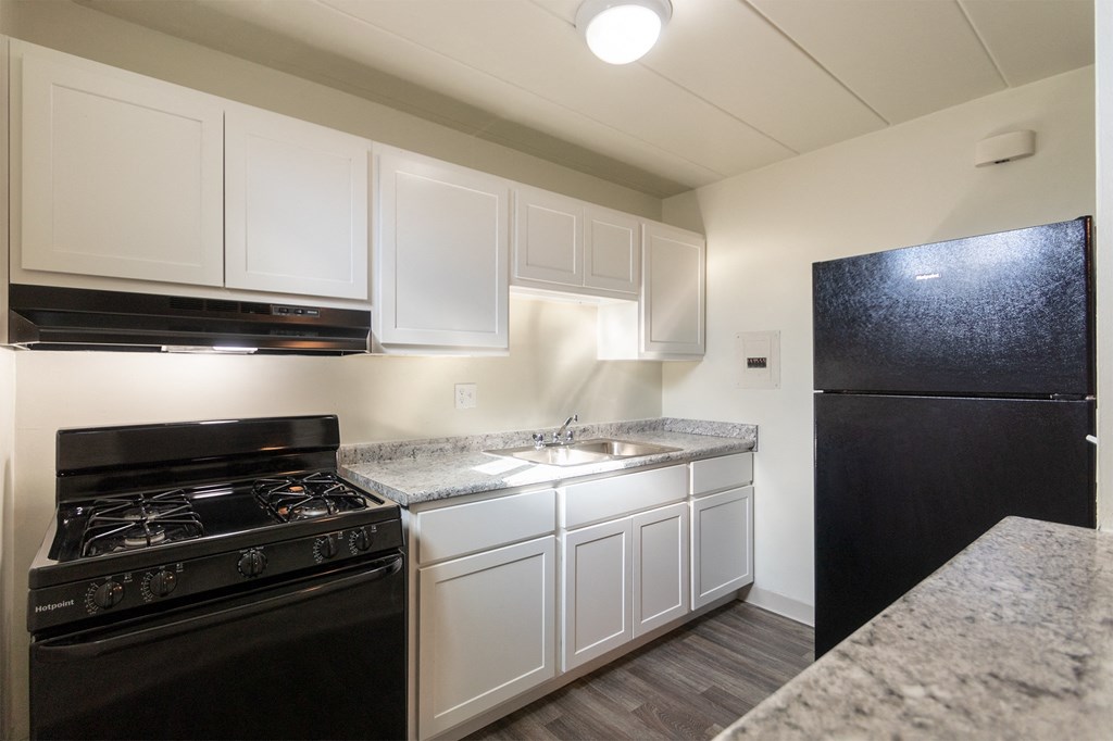 This is a photo of the kitchen in the 550 square foot 1 bedroom, 1 bath patio apartment at College Woods Apartments in the North College Hill neighborhood of Cincinnati, OH.