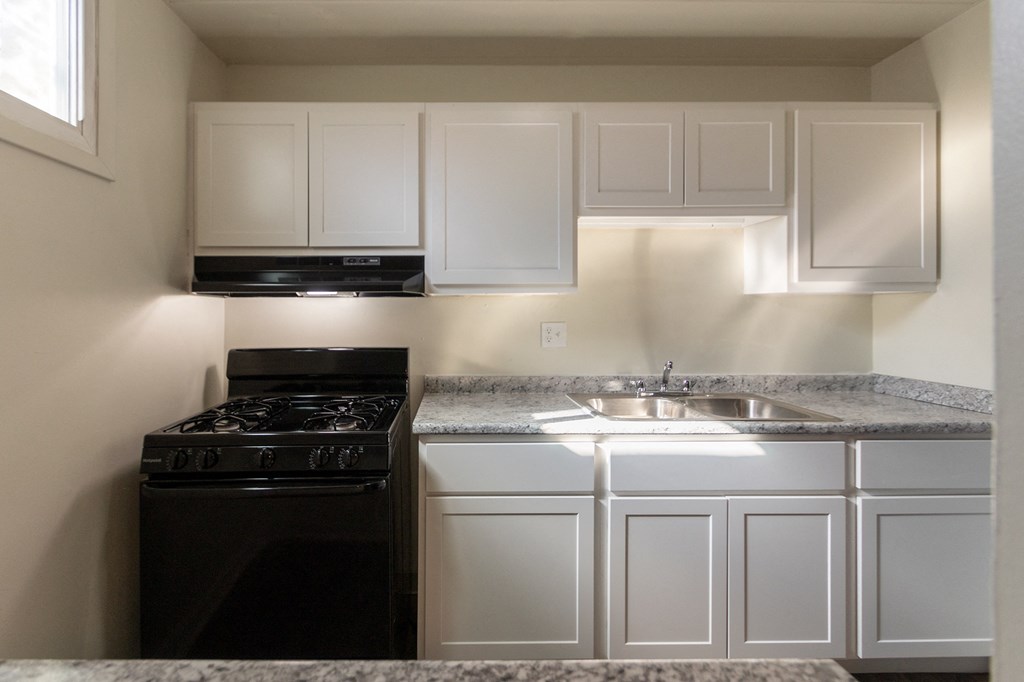 This is a photo of the kitchen in the 550 square foot 1 bedroom, 1 bath patio apartment at College Woods Apartments in the North College Hill neighborhood of Cincinnati, OH.