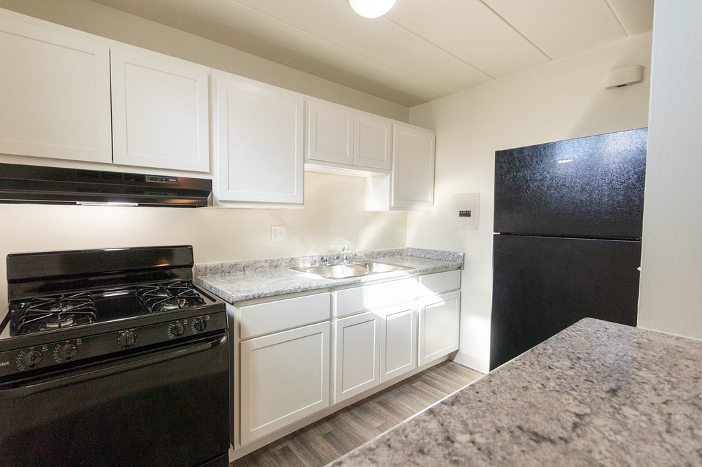 This is a photo of the kitchen in the 550 square foot 1 bedroom, 1 bath patio apartment at College Woods Apartments in the North College Hill neighborhood of Cincinnati, OH.