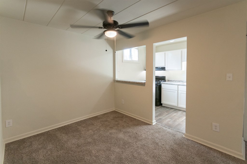 This is a photo of the dining area in the 550 square foot 1 bedroom, 1 bath patio apartment at College Woods Apartments in the North College Hill neighborhood of Cincinnati, OH.