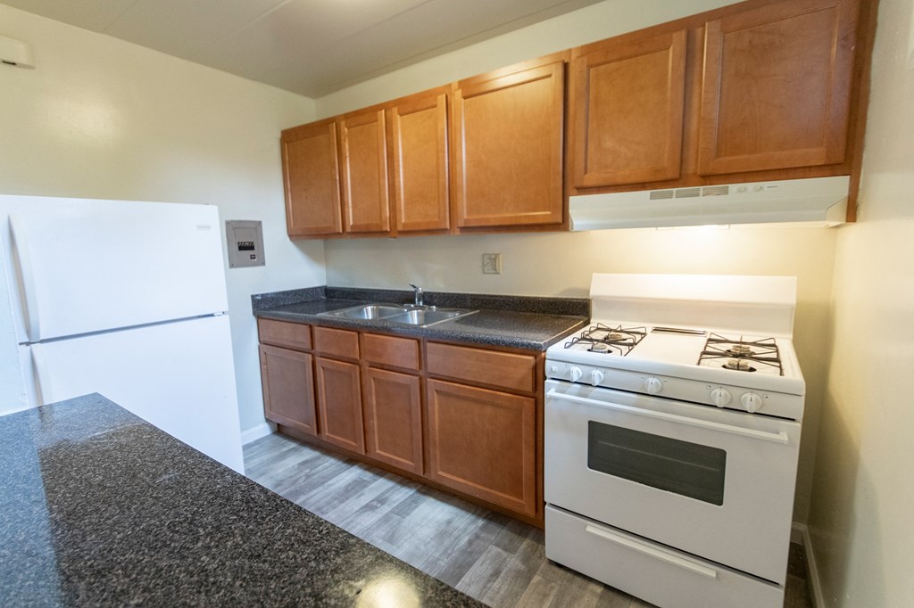 This is a photo of the kitchen of the 550 square foot 1 bedroom, 1 bath patio apartment at College Woods Apartments in the North College Hill neighborhood of Cincinnati, OH.