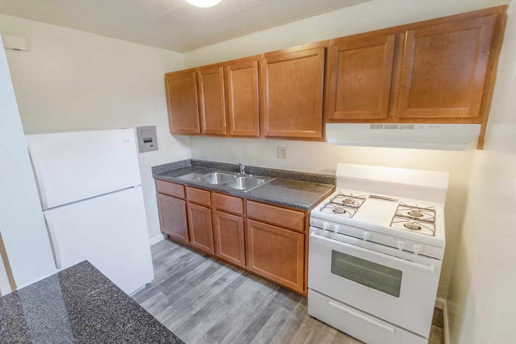 This is a photo of the kitchen of the 550 square foot 1 bedroom, 1 bath patio apartment at College Woods Apartments in the North College Hill neighborhood of Cincinnati, OH.