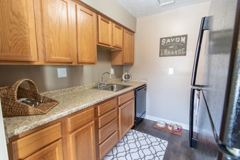 This is a photo of the kitchen in the upgraded 650 square foot, 1 bedroom model apartment at Deer Hill Apartments in Cincinnati, Ohio. - Photo Gallery 4