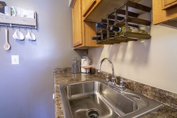 This is a photo of the kitchen in the 950 square foor, 2 bedroom apartment at Deer Hill Apartments in Cincinnati, OH. - Photo Gallery 2