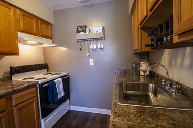 This is a photo of the kitchen in the 950 square foor, 2 bedroom apartment at Deer Hill Apartments in Cincinnati, OH.