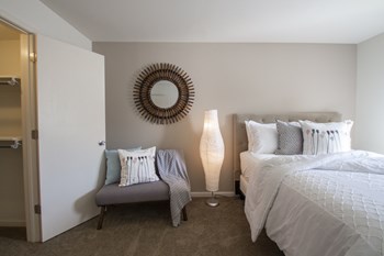 This is a picture of the primary bedroom in an upgraded 980 square foot, 2 bedroom, 1 bath model apartment at Fairfield Pointe Apartments in Fairfield, Ohio. - Photo Gallery 23