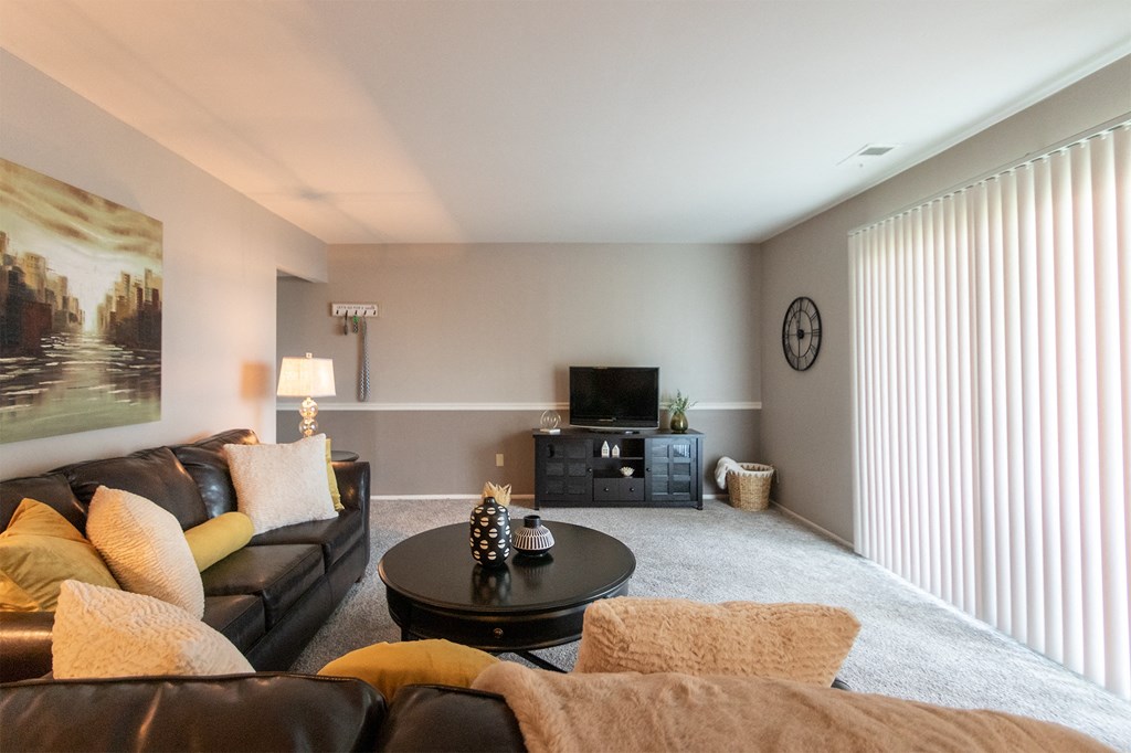 Living Room With Oversized Windows And Doors  at Fairfield Pointe, Ohio