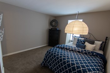 This is a picture of the second bedroom in an upgraded 980 square foot, 2 bedroom, 1 bath model apartment at Fairfield Pointe Apartments in Fairfield, Ohio. - Photo Gallery 26