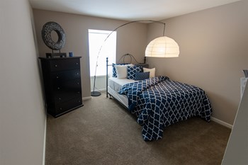 This is a picture of the second bedroom in an upgraded 980 square foot, 2 bedroom, 1 bath model apartment at Fairfield Pointe Apartments in Fairfield, Ohio. - Photo Gallery 25