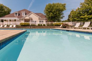 This is a picture of the Albamarle clubhouse pool area at Fairfield Pointe Apartments in Fairfield, Ohio.