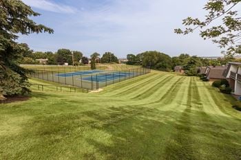This is a picture of the some tennis courts at Fairfield Pointe Apartments in Fairfield, Ohio.