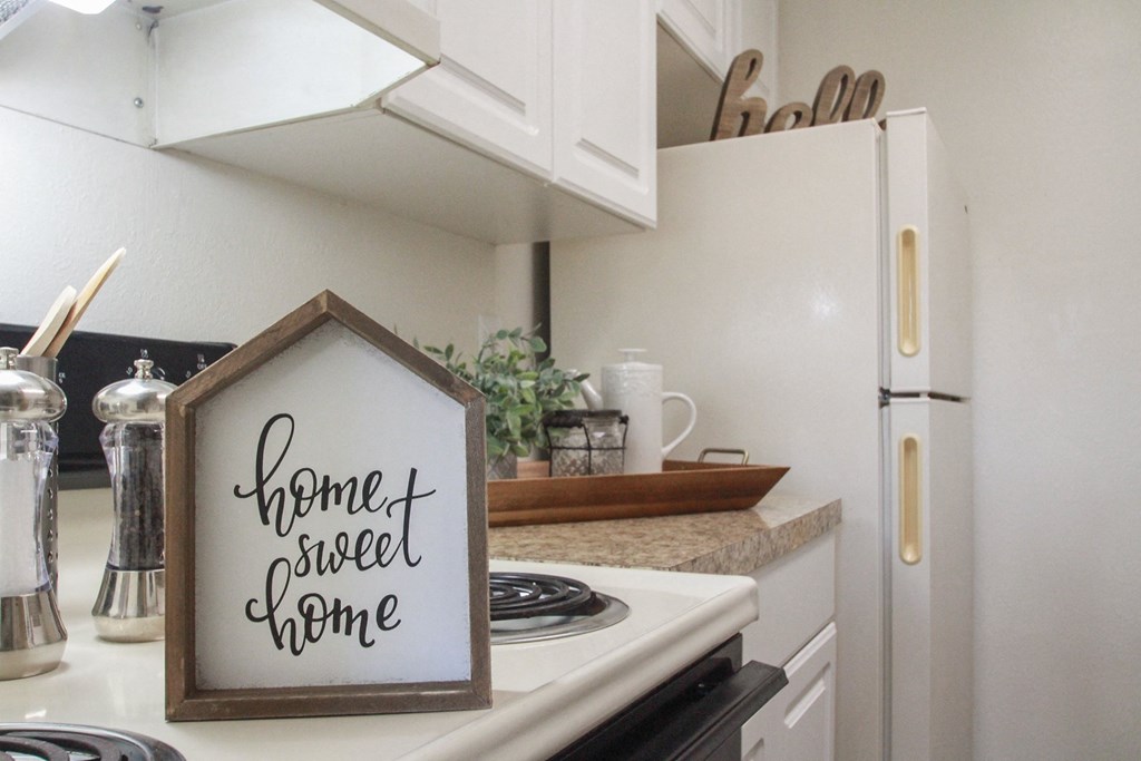 This is a photo of the kitchen in the 653 square foot 1 bedroom apartment at Harvard Square Apartments, in Dallas, TX.