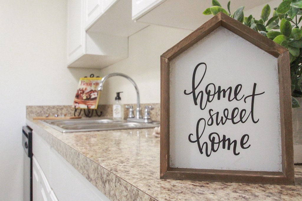 This is a photo of the kitchen in the 653 square foot 1 bedroom apartment at Harvard Square Apartments, in Dallas, TX.
