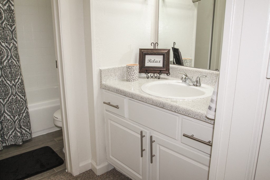 This is a photo of the bathroom  in the 653 square foot 1 bedroom apartment at Harvard Square Apartments, in Dallas, TX.