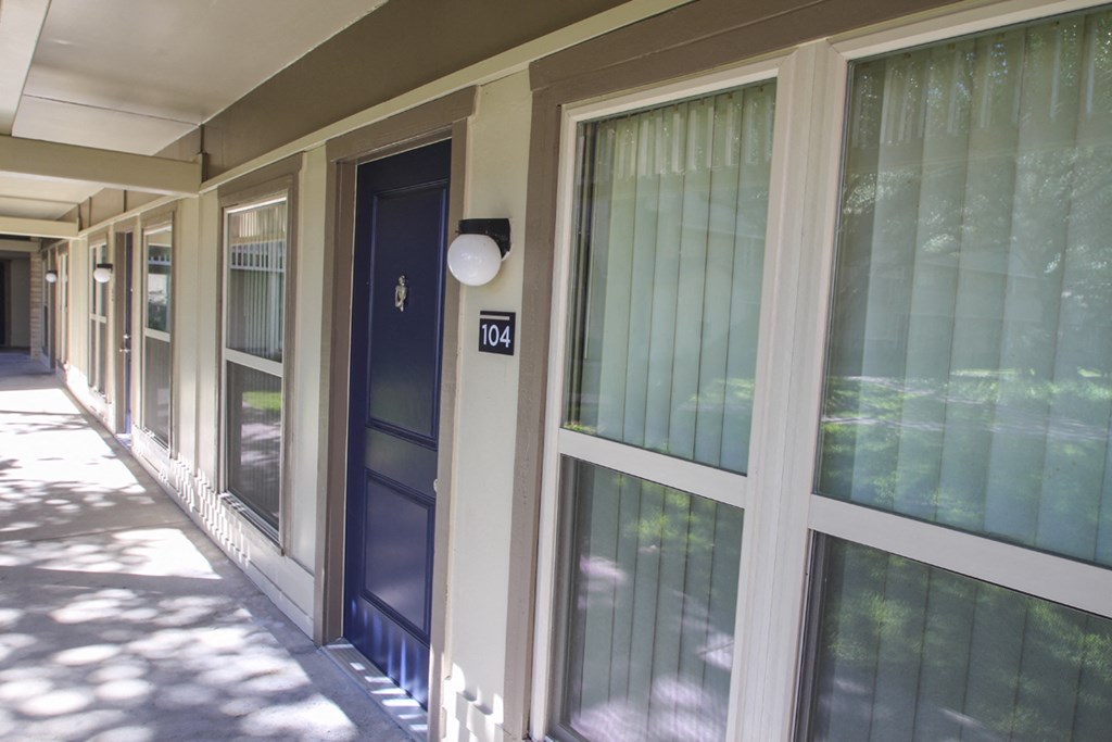 This is a photo of a building exterior at Harvard Square Apartments in Dallas, TX.