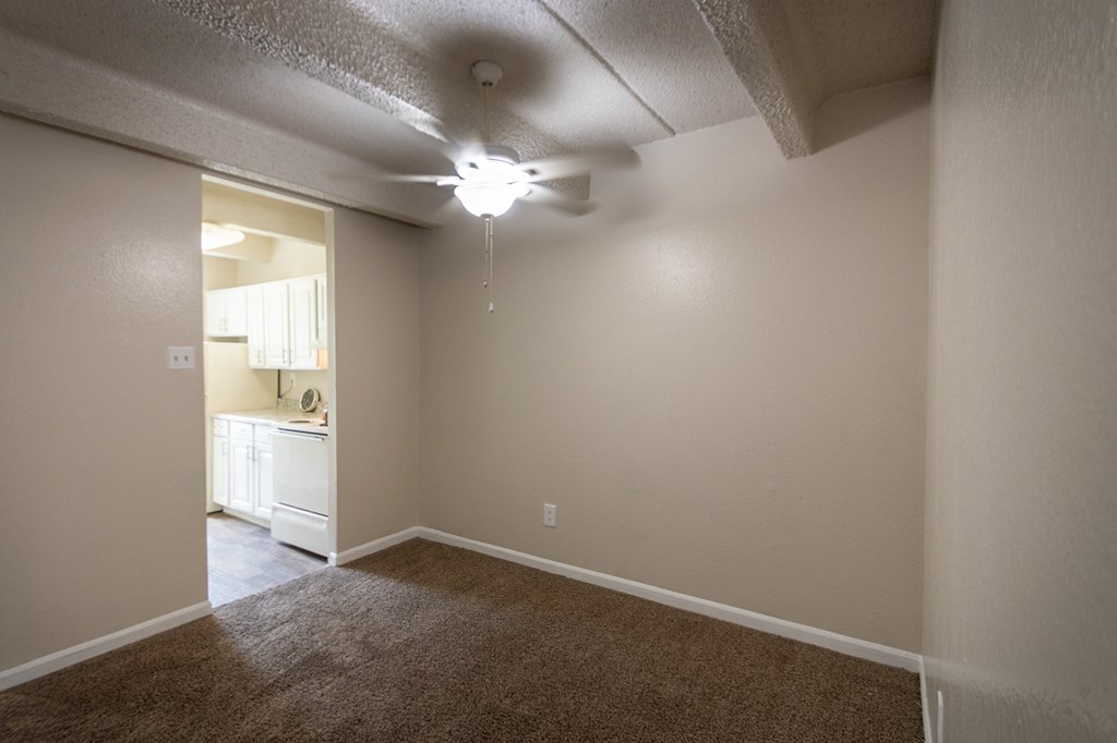 This is a photo of the dining area in the 965 square foot 2 bedroom, 2 bath  apartment at Harvard Square Apartments, in Dallas, TX.