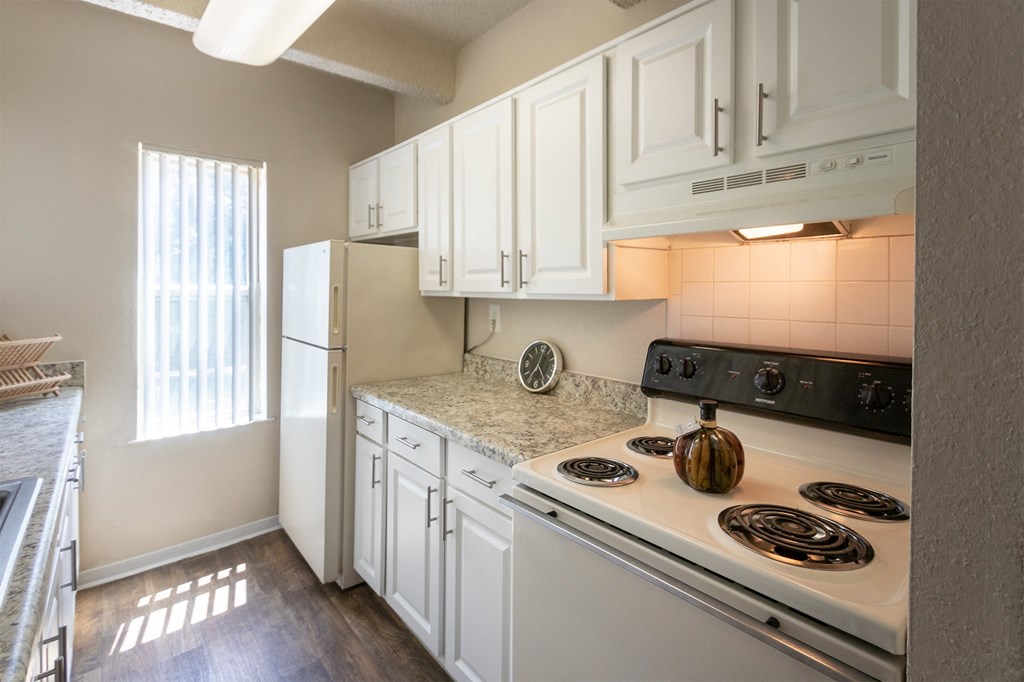 This is a photo of the kitchen in the 965 square foot 2 bedroom, 2 bath  apartment at Harvard Square Apartments, in Dallas, TX.