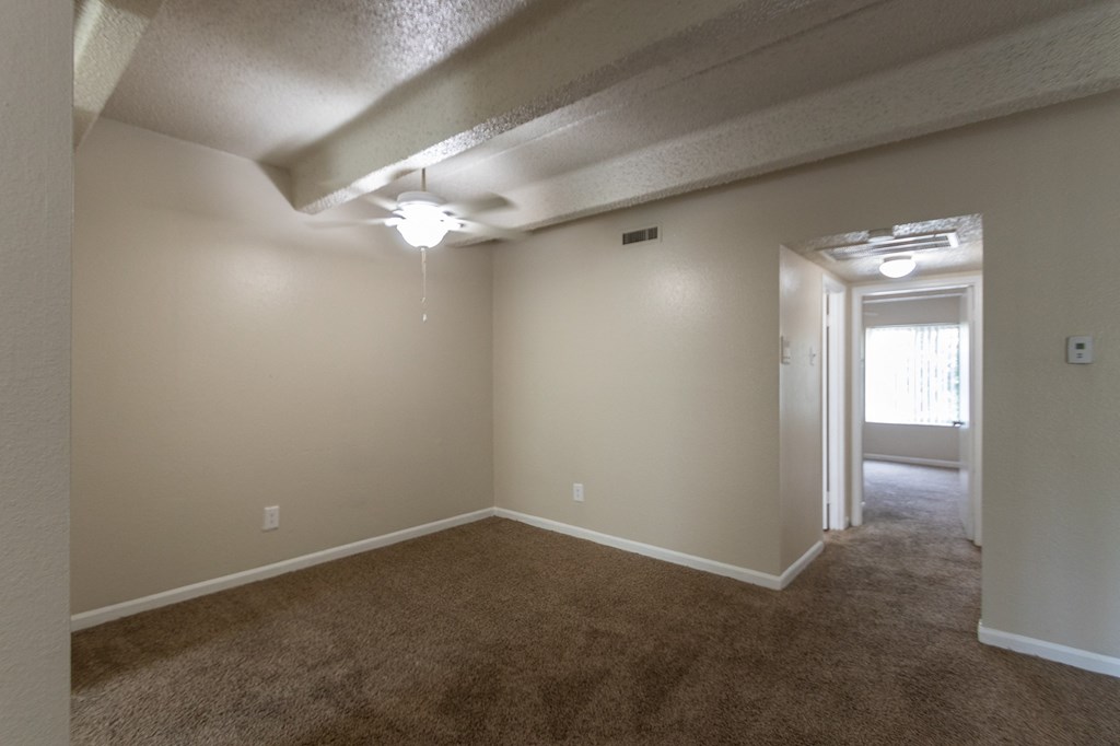 This is a photo of the dining area in the 965 square foot 2 bedroom, 2 bath  apartment at Harvard Square Apartments, in Dallas, TX.