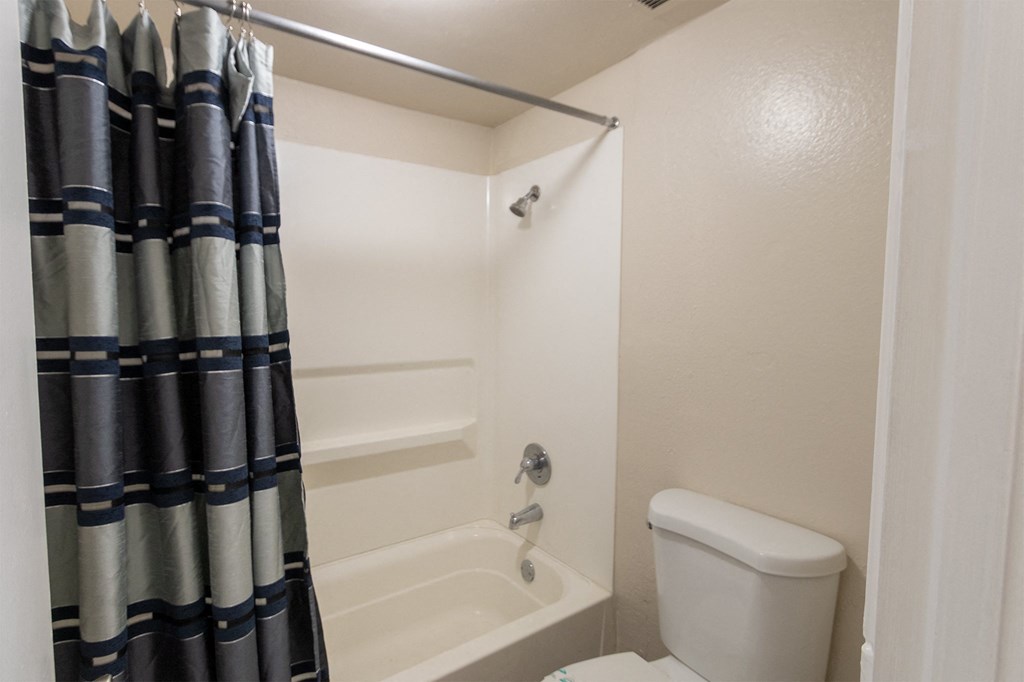 This is a photo of the primary bathroom in the 965 square foot 2 bedroom, 2 bath  apartment at Harvard Square Apartments, in Dallas, TX.