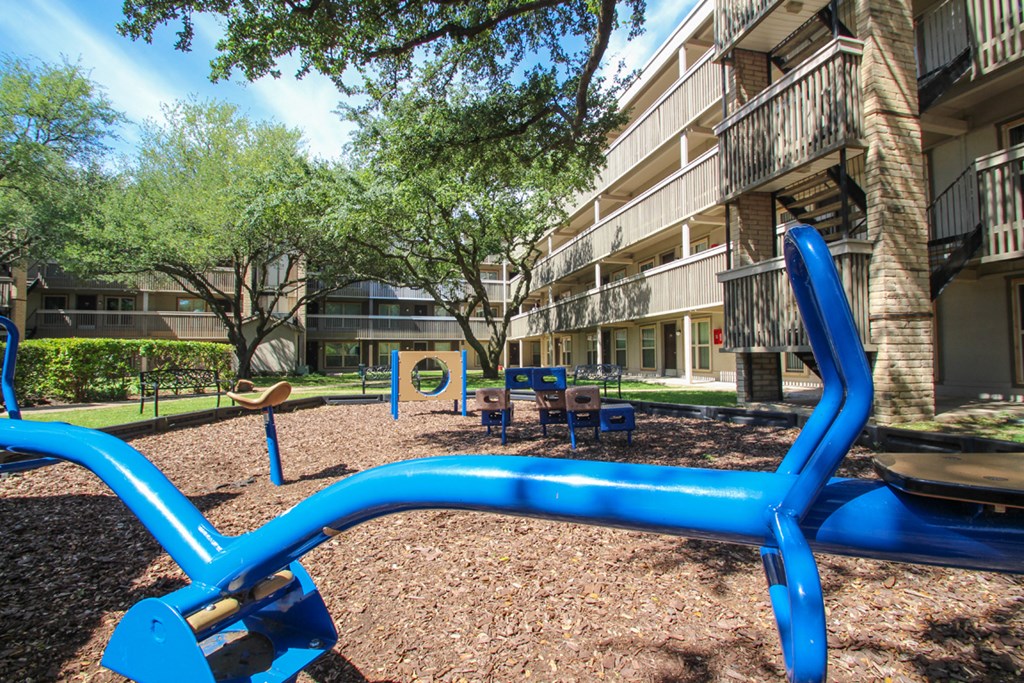 This is a photo of the playground at Harvard Square Apartments in Dallas, TX.