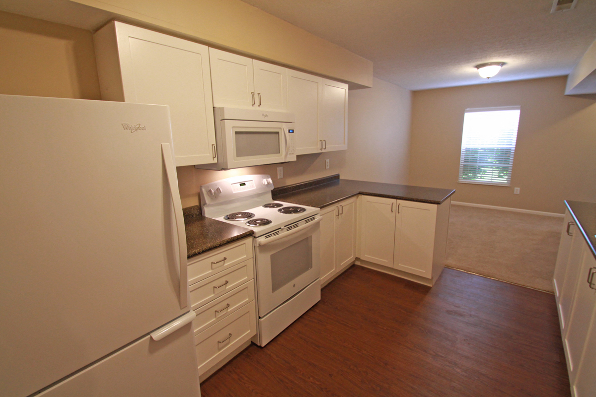 This is a photo of the kitchen in the 1490 square foot 3 bedroom Presidential at Washington Place Apartments in Washington Township, OH.