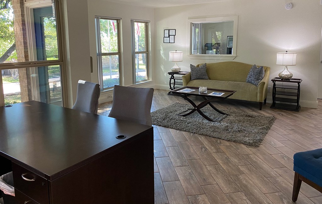 a living room with a couch and a table