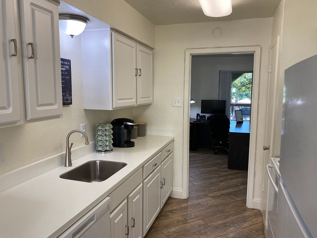 This is a photo of Leasing Office kitchen/2 bedroom, 2 bath 1116 quare foot "C"  floor plan at Woodbridge Apartments in Dallas, Texas.