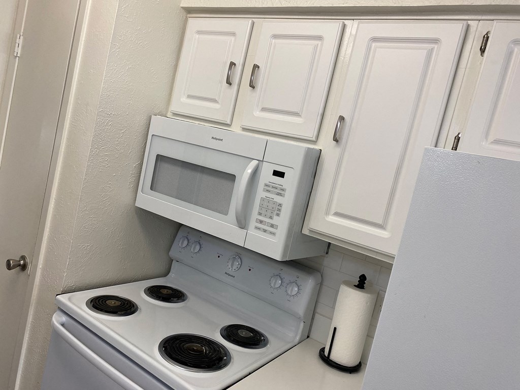 This is a photo of Leasing Office kitchen/2 bedroom, 2 bath 1116 quare foot "C"  floor plan at Woodbridge Apartments in Dallas, Texas.
