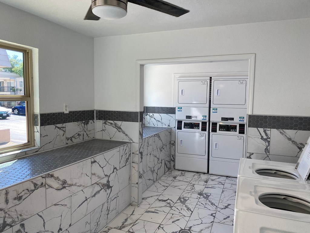 This is a photo of the community clothes center at Woodbridge Apartments in Dallas, Texas.