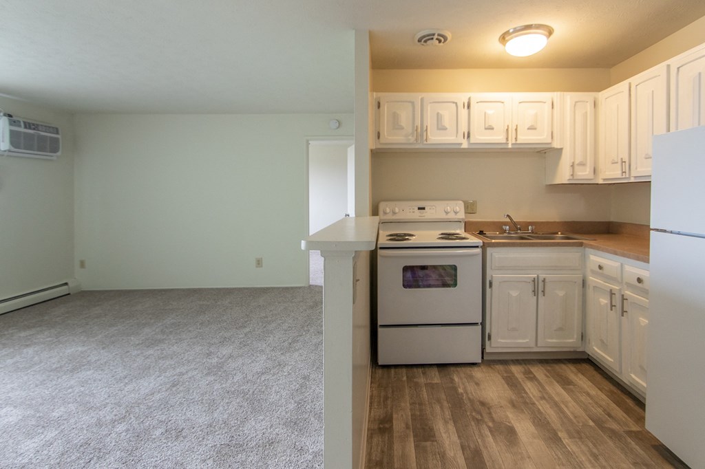 This is a photo of the kitchen and living room in the 545 square foot 1 bedroom, 1 bath apartment at Lisa Ridge Apartments in the Westwood neighborhood of Cincinnati, Ohio.