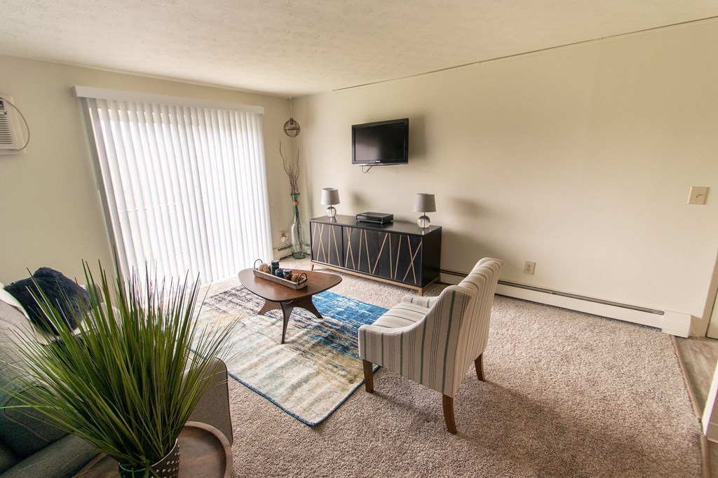 This is a photo of the living room in the 705 square foot 2 bedroom, 1 bath apartment at Lisa Ridge Apartments in the Westwood neighborhood of Cincinnati, Ohio.